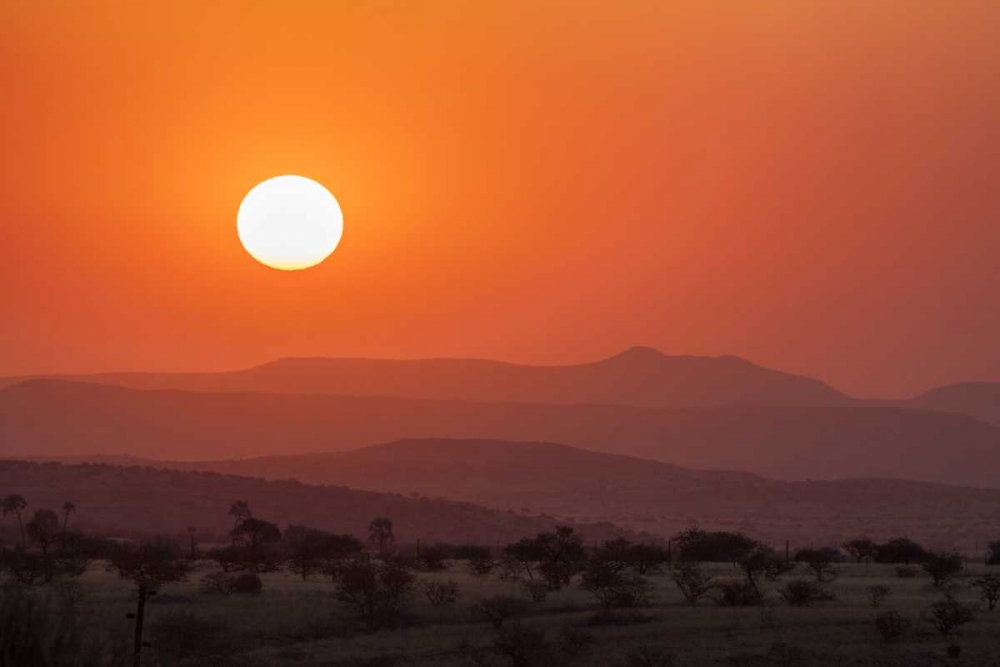 Art Print: Namibia, Damaraland Orange sunset over mountains