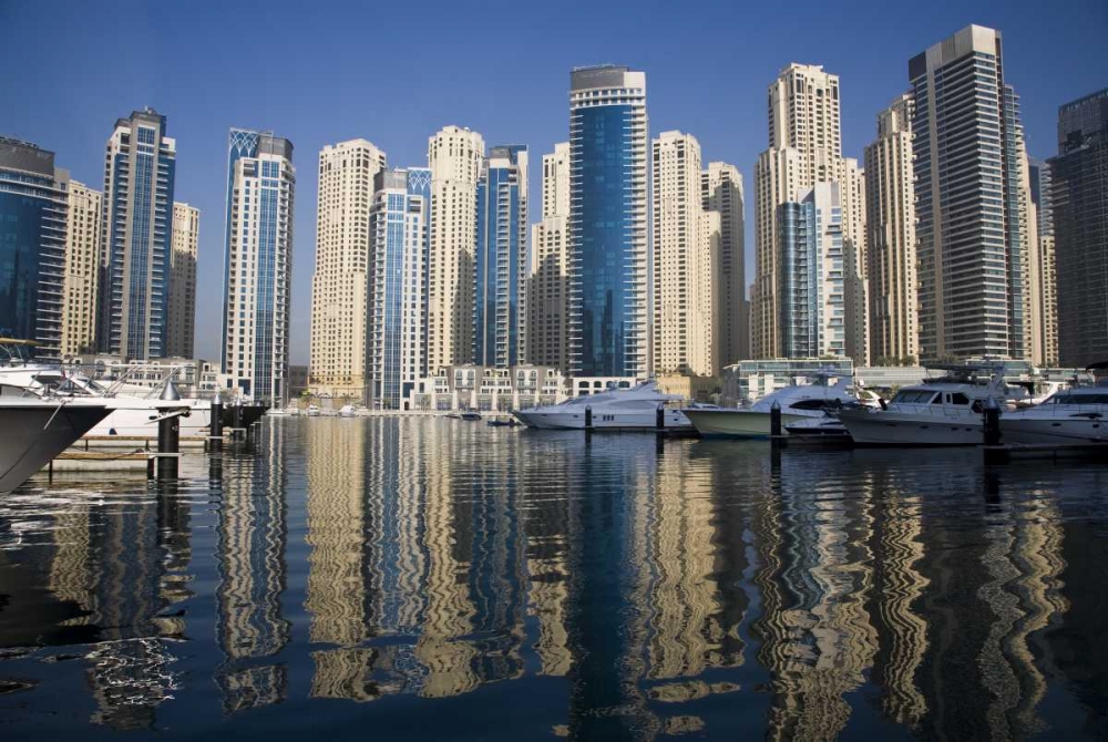 Art Print: UAE, Dubai Marina towers with boats at anchor