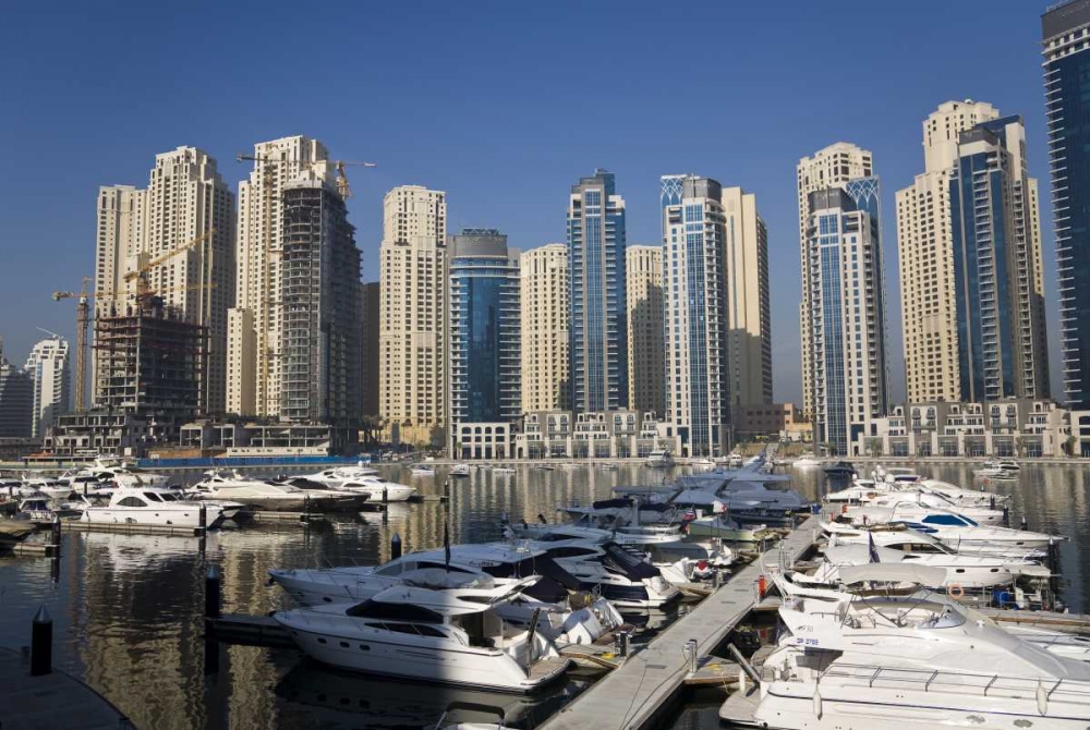 Art Print: UAE, Dubai Marina towers with boats at anchor