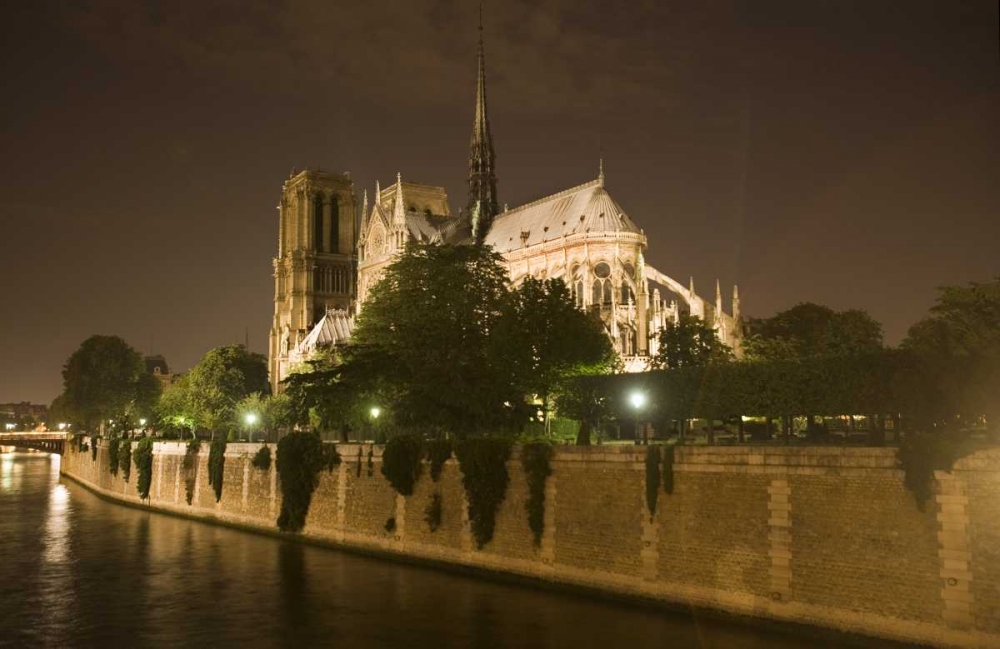 Art Print: France, Paris Notre Dame Cathedral lit at night