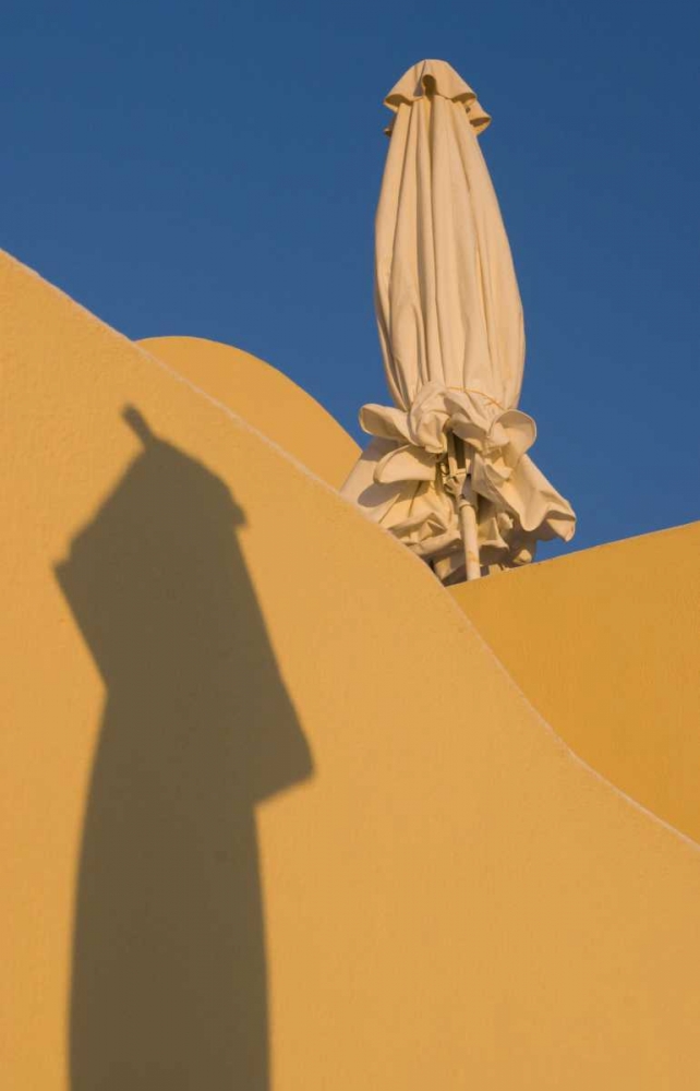 Art Print: Greece, Santorini Sun umbrella against a wall
