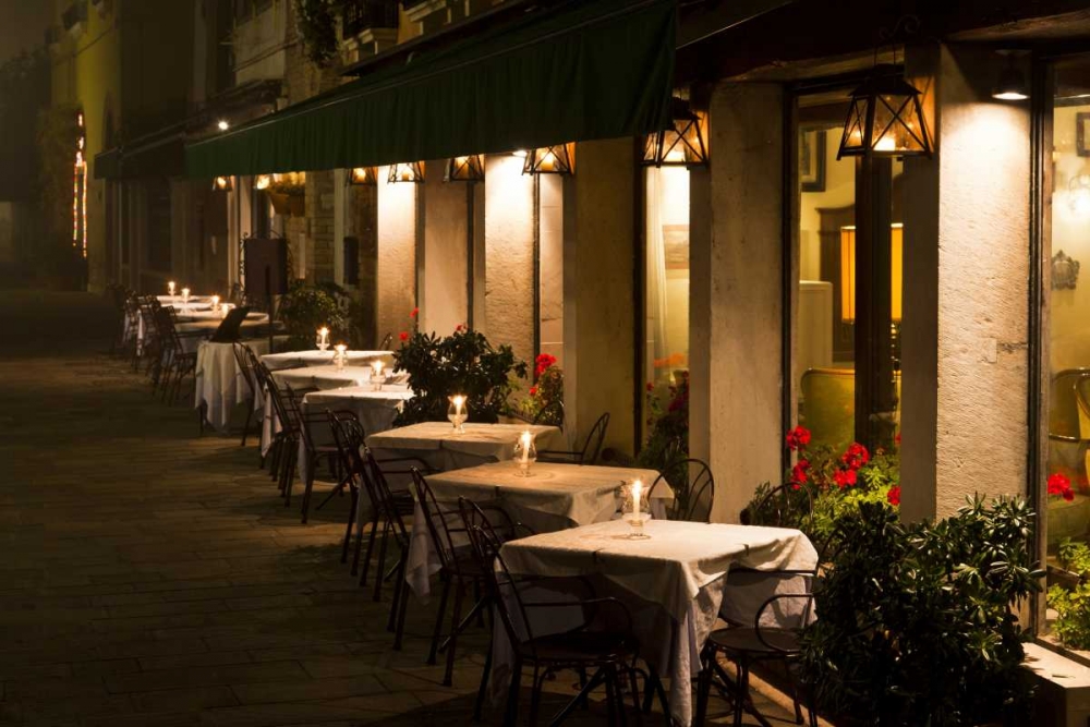 Art Print: Italy, Venice Restaurant tables lit at night