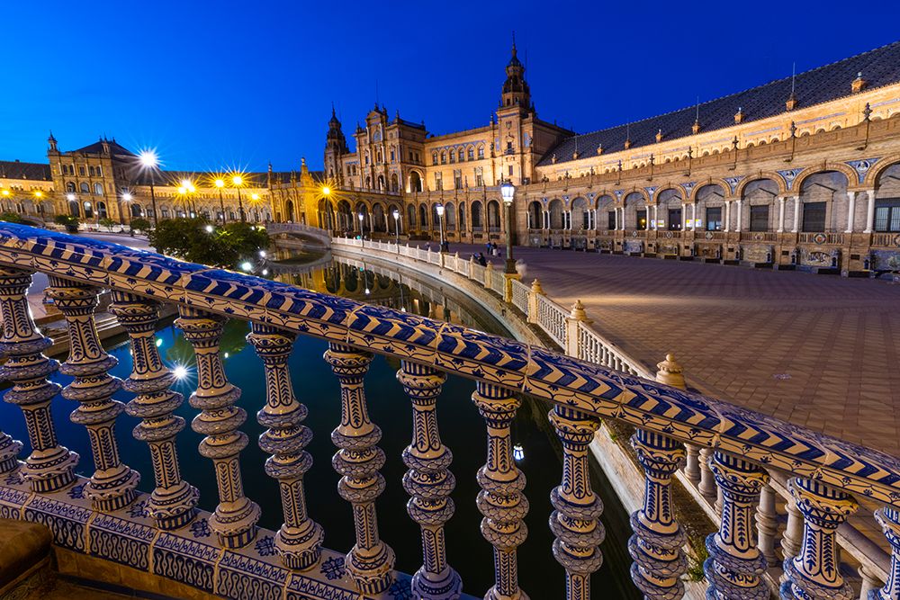 Art Print: Spain-Seville. Plaza de Espana lit at sunset.